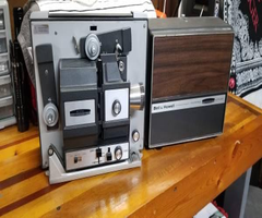 Vintage Bell&Howell Projector plus extras