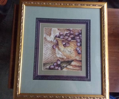 Pair of ornate gold framed pictures